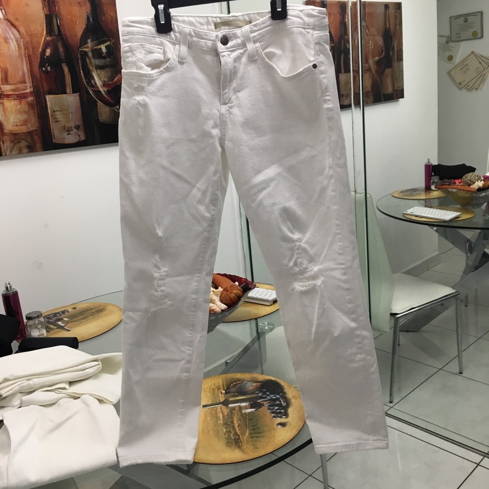 Stressed white skinny jeans